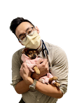 Veterinarian Dr. Andy Chiang, DVM, with a Chihuahua puppy